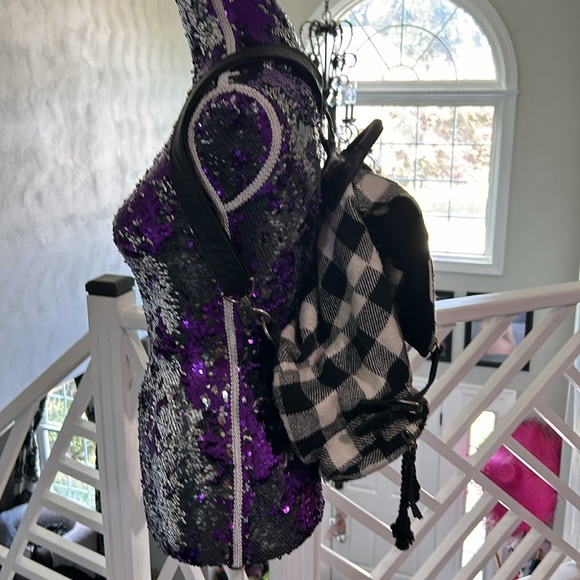 Roxy backpack has been worn  length 12” width 51/2 or 6 Height 17” - Picture 2 of 5